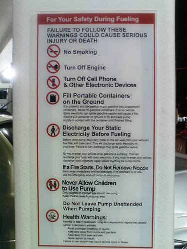 Warning plaque at petrol pump