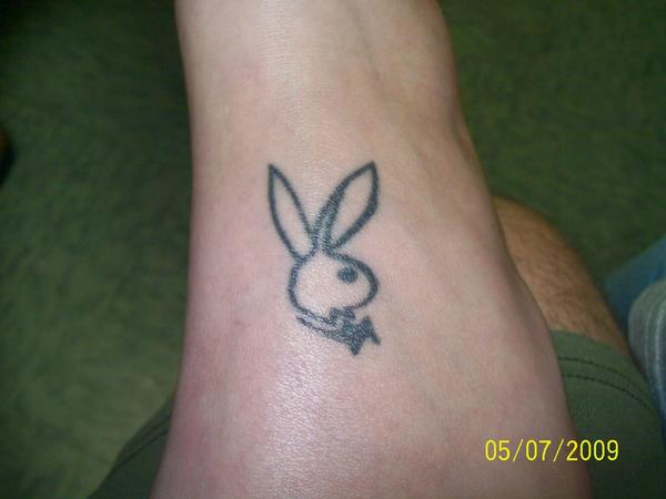Once upon a time, Holly Madison had a pink playboy bunny tattoo on her lower