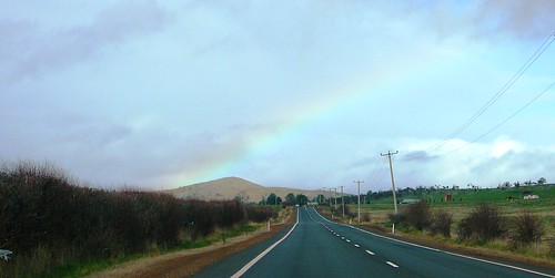 9 of 12: Rainy Landscape and Rainbow out the car window