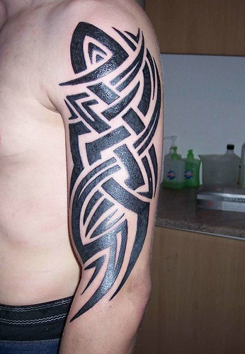 Tribal Tattoo Design on the Male Arm