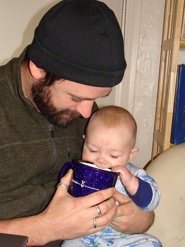 Eric giving Silas a taste of coffee... or at least the cup