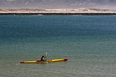 Lone Mark 1 kayaker (surf ski), near Morro Roc...