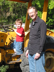Gavin and Grandpa with a tractor