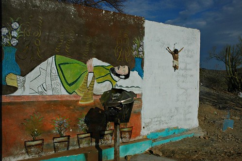 Death of Saints. Religious Folk Art Painting and Crucified Christ statue, Hillside shrine, Hermosilla, Mexico by Wonderlane