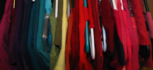 Shirts organized in color order