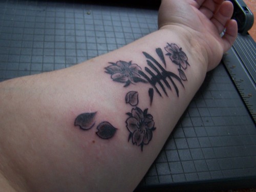 Tattoos On Inner Arm. inner arm tattoo. kanji symbol for beauty along with sakura blossoms and 4