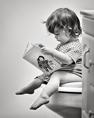 Toddler Reading on Potty by Jay Ryness