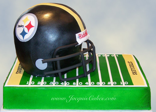 Steelers Football Helmet. This 3D football helmet cake sits on top of a full 