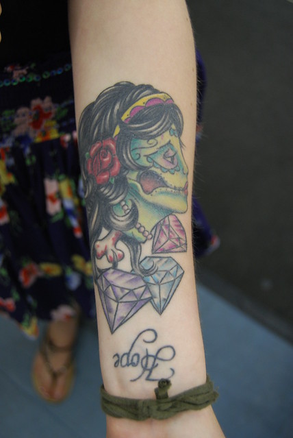 nu skool zombie gypsy tattoo on forearm. you can see the girl and tattoo by 