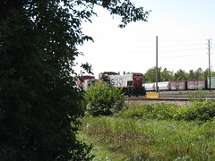 A former Soo Line EMD MP 15 yard switcher and caboose. Schiller Park Illinois. Late September 2009.