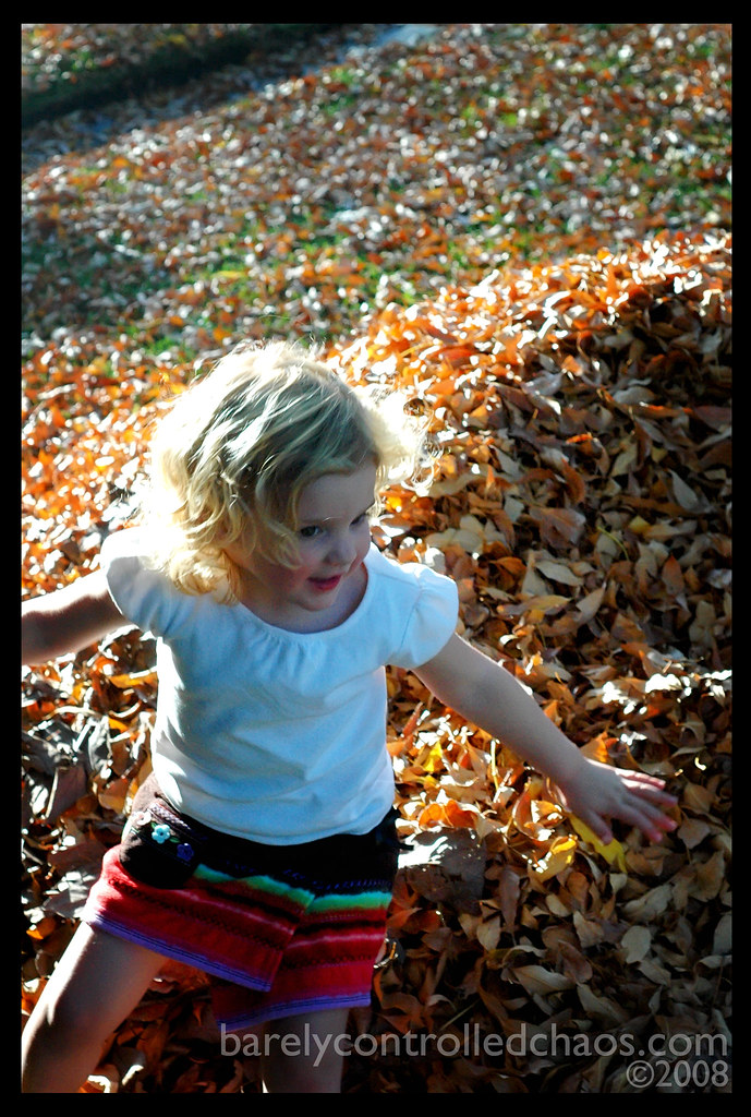Playing in the leaf mountain