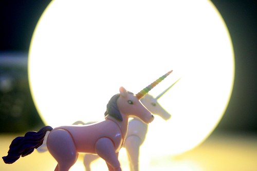 unicorns with glowing orb