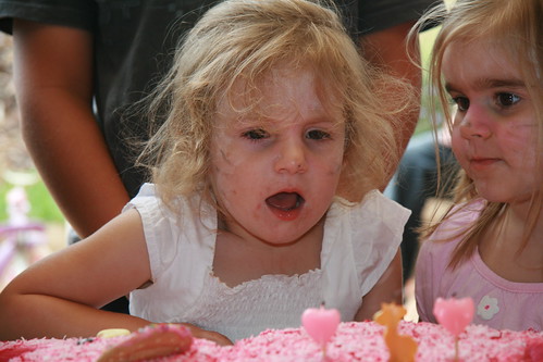 Chloe blows out her candles