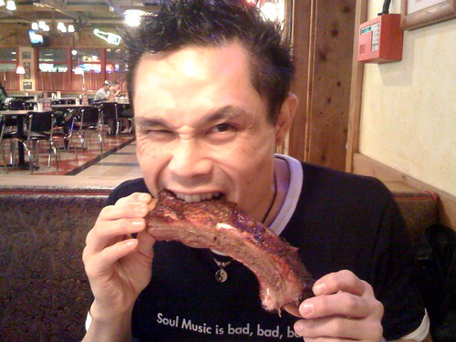 rik eating ribs from Pappas in Houston, taken by Eli