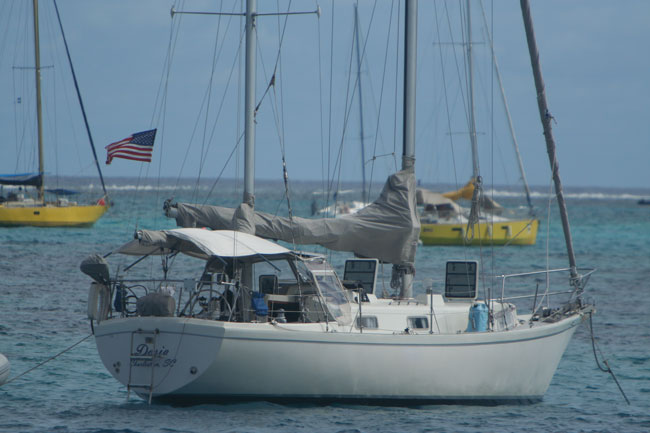 Dosia at anchor in a nice breeze.  Outside Marina Taina, Papeete, Tahiti