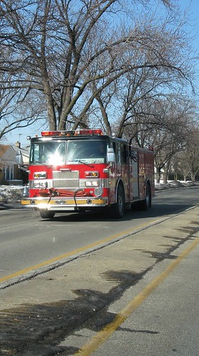 Southbound Niles Fire Department fire truck speeding to an emergency call. Niles Illinois. Early March 2009.