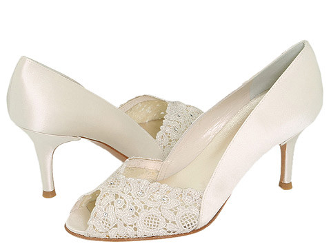 Elegant bridal shoes with the open end. 