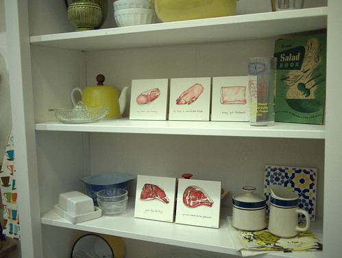 shelf of tiny pig and beef art