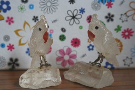 A001 and A002 - White with orange beak set on clear crystal (2)