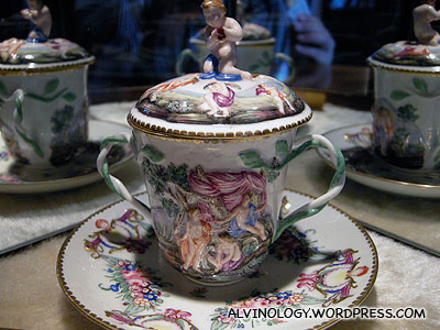Cup with many angels and fairies