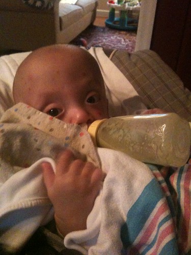 Max holds his bottle