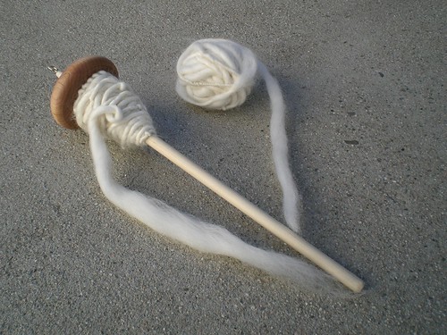 Ball of yarn + Yarn on spindle