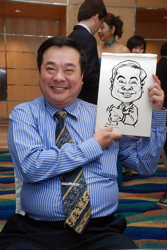 Caricature live sketching for AXA Award Nite 2009 - 1