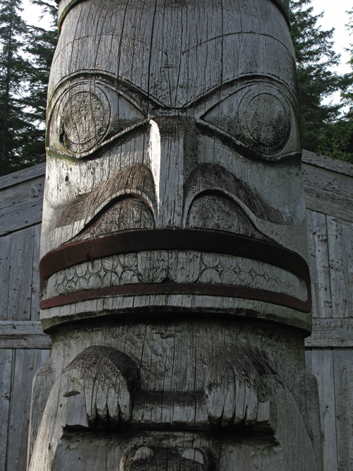 beaver figure in front of Chief Son-i-Hat Whale House, Kasaan, Alaska