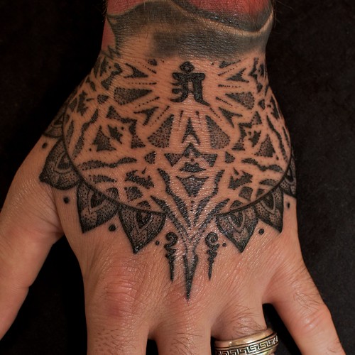 Hand tattoo by Jondix
