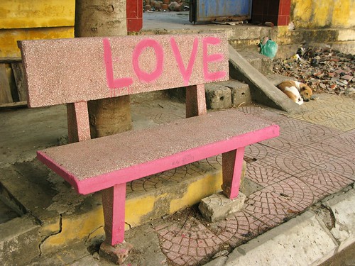 Love bench and napping dog, Cat Ba Island, Vietnam