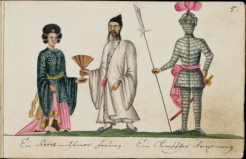 Chinese man & woman in costume and knight in armor