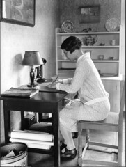 A writer writes. Photo circa 1920, courtesy Cornell University Library