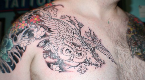 Tattoo owl animal decoration on the chest