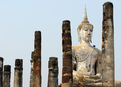 Buddha in a field of columns - Sukhothai, Thailand