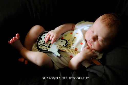 Baby Waylon seems to be quite content with his guitar mom and dad's wedding