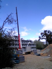 Containerised apartment module ready to be lifted into position at ANU
