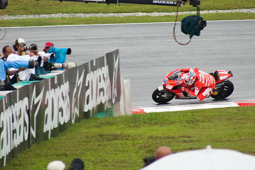 Casey Stoner attracting the attention at Turn 2