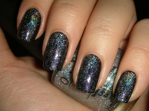 The holographic glitter is quite dense, so I'm not sure why it's a top coat.