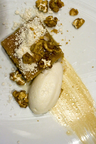Top view of Caramel cake with popcorn ice cream, peanut butter powder