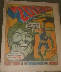 2000AD Prog 77, with a very large green coloured character holding Dredd and saying 'Ho Ho Ho'. Art Brian Bolland (flickr)