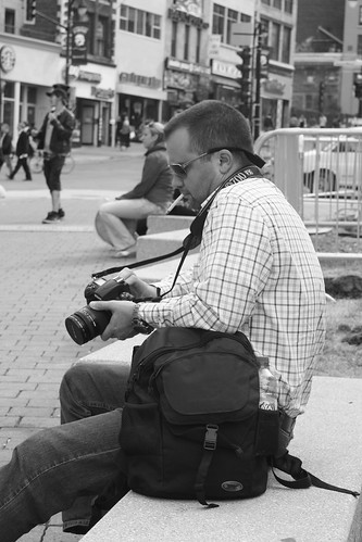 Photographer checking his work
