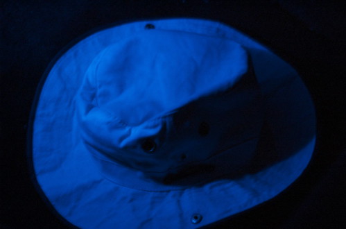 White hat, blue light