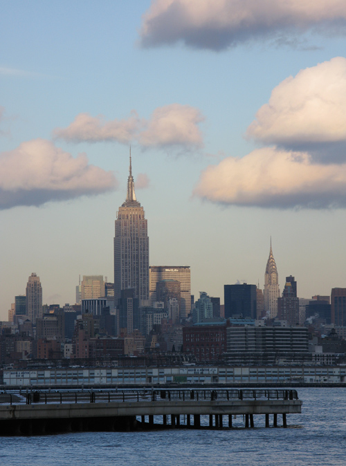 puffy clouds and the Empire State Building from the Jersey side, Hudson River, NYC