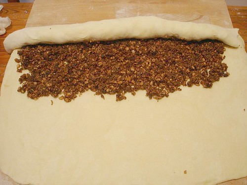 Rolling the dough over the filling
