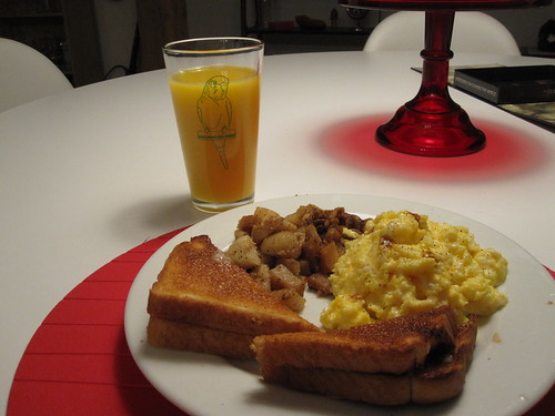 OJ, scrambled eggs, toast and potatoes sautéed in onions and duck fat - from groceries