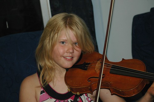 Rose plays violin