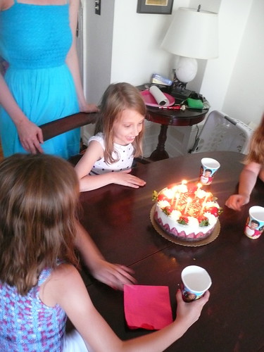 blowing out the candles.