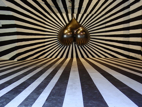  a dis-orientating ultra-perspective black and white illusion room with a 