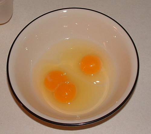 On the left are two yolks from one egg.