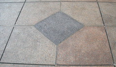 Bow Tie Block in the Sidewalk at Lincoln Plaza